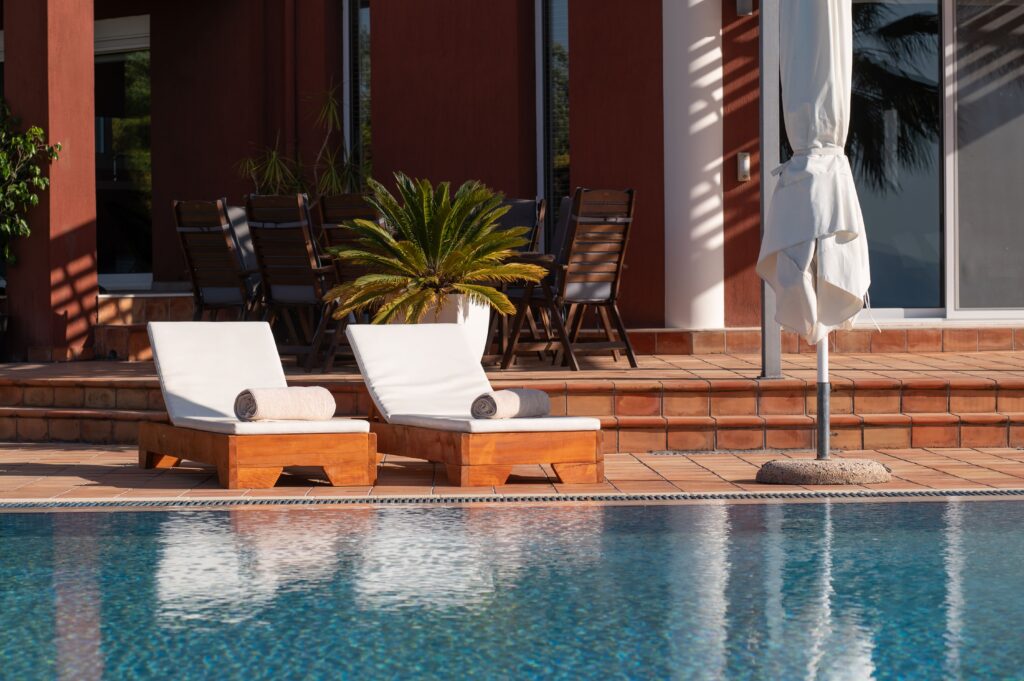 Cozy and relaxing poolside seating with soft cushions