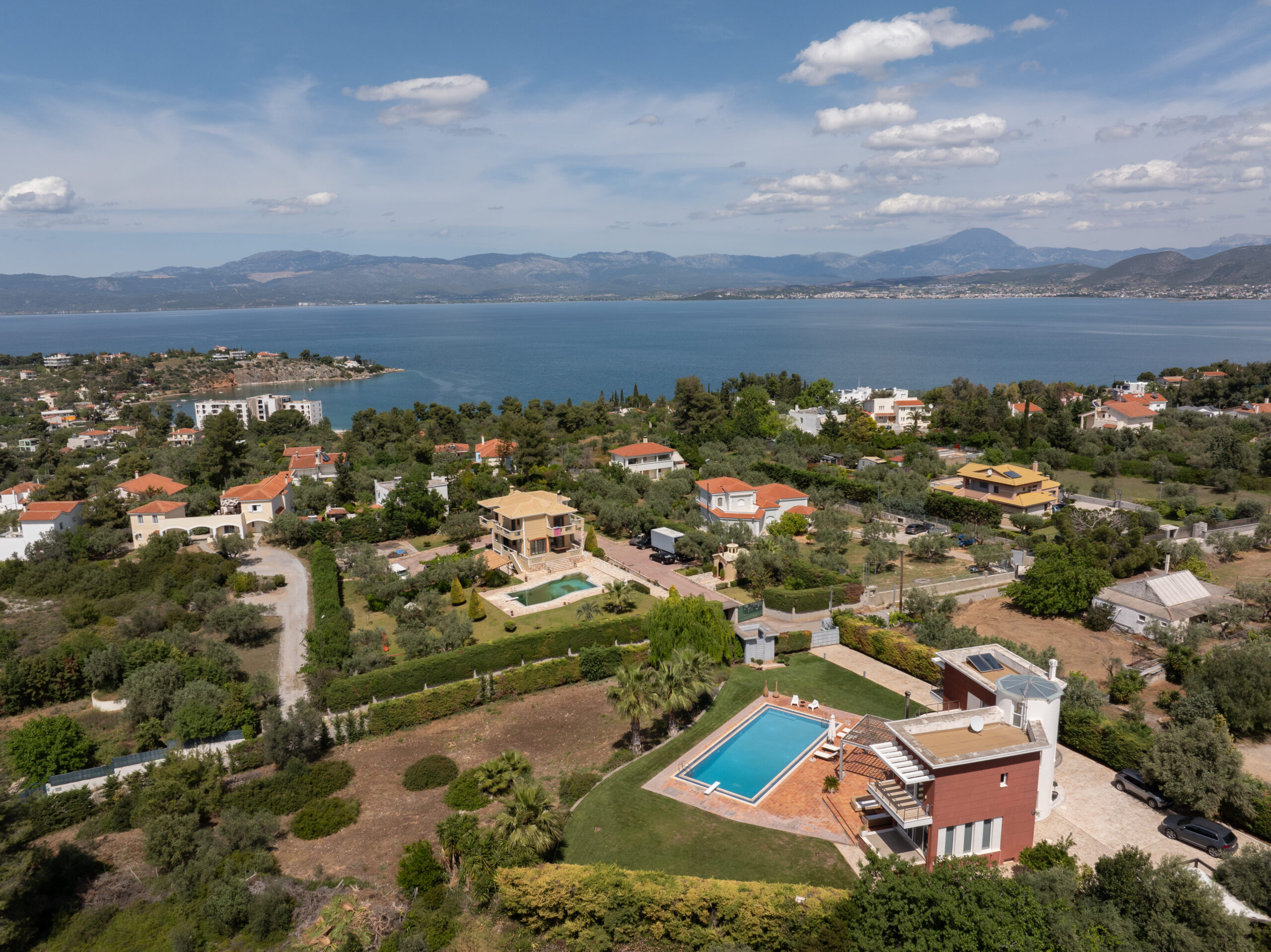 Panoramic shot of villa exterior and garden area at private villa near Athens
